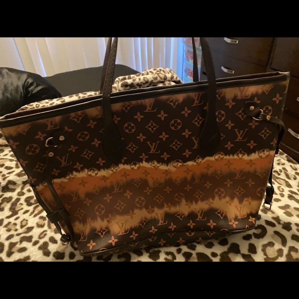Designer I spired brown purse